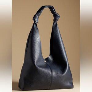 The love knot Slouchy Bag-Anthropologie-Black 15”Length 14”tall-NEW in plastic!